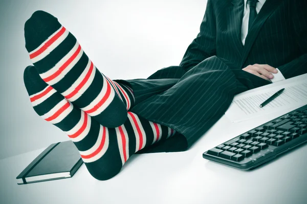 Businessman relaxing in the office — Stock Photo, Image