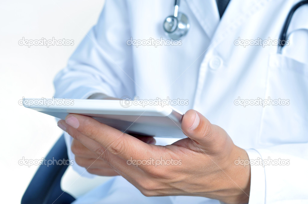 doctor checking out his tablet