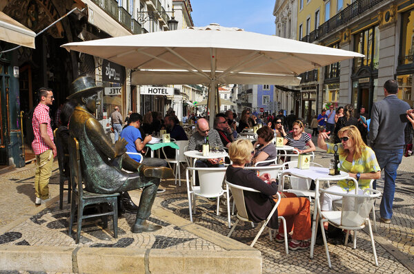 Statue of Fernando Pessoa in the terrace of Cafe A Brasileira in