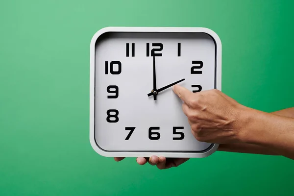 Young Caucasian Man Sets White Clock Backward End Summer Time — Stock Photo, Image