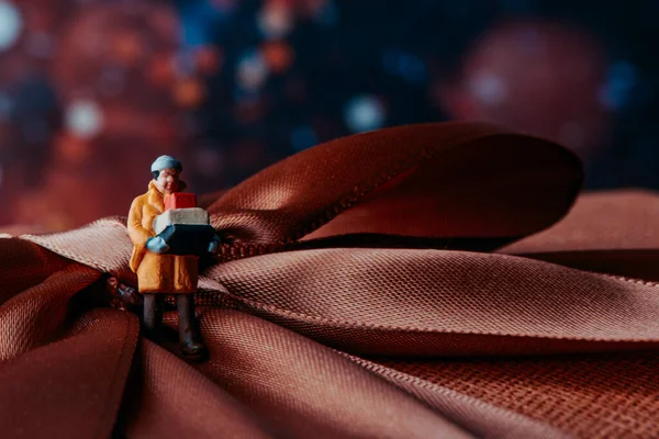 Closeup Miniature Man Wearing Warming Coat Carrying Pile Boxes Standing — Stock Photo, Image