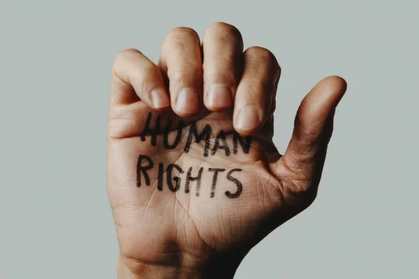 Closeup Hand Man Text Human Rights Written White Background — Stock Photo, Image