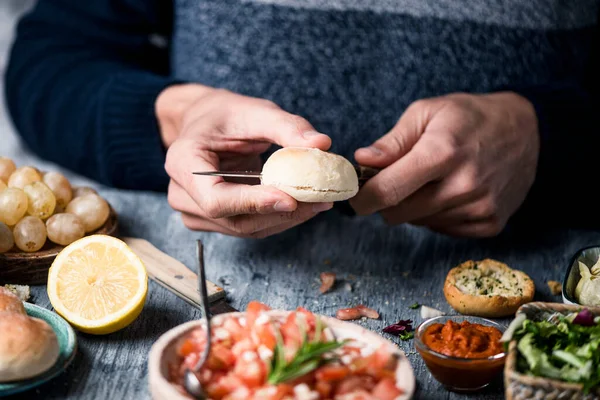 Closeup Young Caucasian Man Cutting Bread Bun Prepare Mini Sandwich — Stock Photo, Image