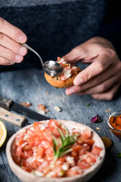 Closeup Bowl Tomato Salad Gray Rustic Table Young Caucasian Man — Stock Photo, Image