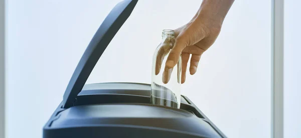 Closeup Young Caucasian Man Throwing Empty Glass Bottle Home Recycling — Stock Photo, Image