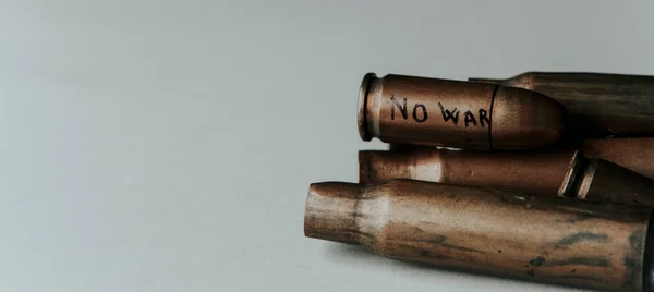 Some Used Bullet Shells Gray Background Text War Written Bullet — Stock Photo, Image