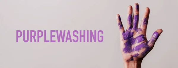 Text Purplewashing Raised Hand Man Stains Purple Paint Gray Background — Stock Photo, Image