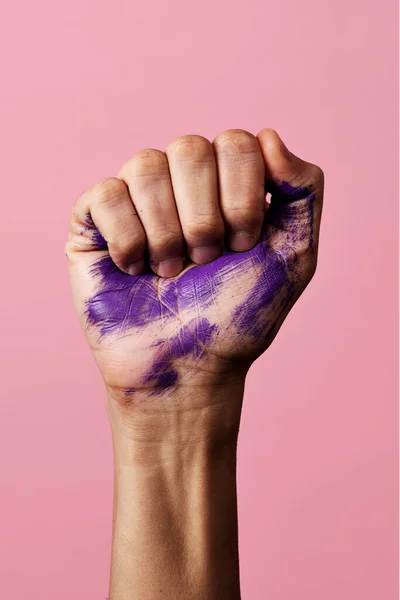 Clenched Fist Man Some Stains Purple Paint Pink Background — Stock Photo, Image