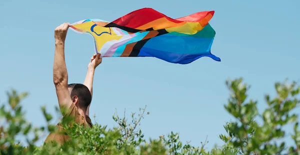 Closeup Man Waving Intersex Inclusive Progress Pride Flag His Head — Stock Photo, Image