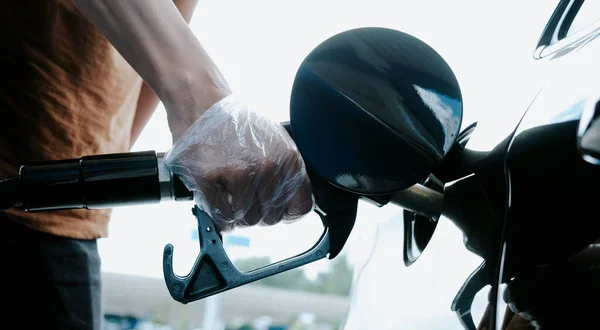 Closeup Young Caucasian Man Wearing Clear Plastic Gloves Filling Fuel — Foto de Stock