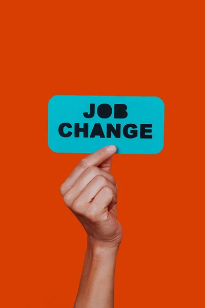 Caucasian Man Holds Blue Paper Signboard Text Job Change Orange — ストック写真