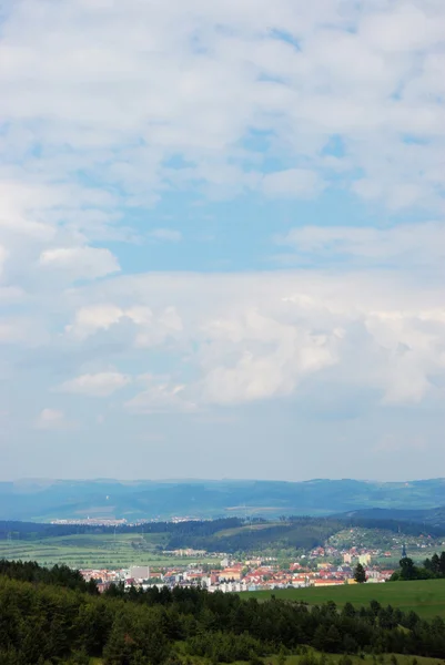 Paesaggio con città — Foto Stock