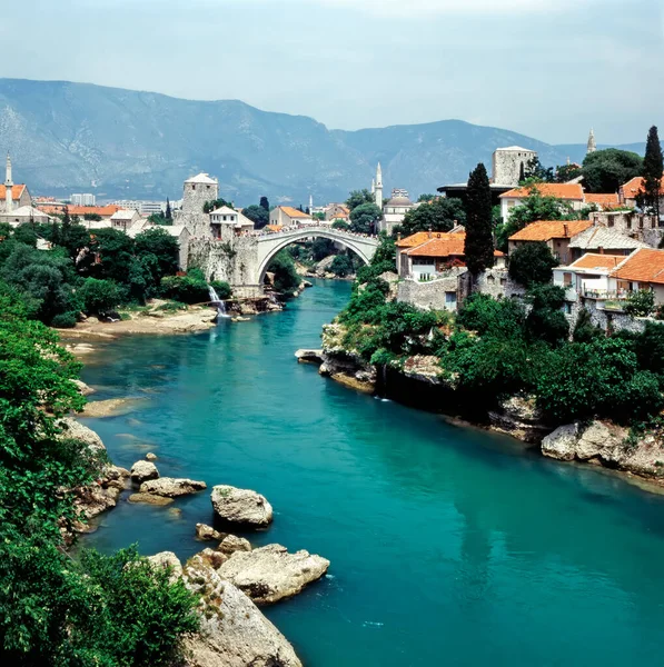 Traditional sport of jumping in river Neretva from Old Bridge iin Mostar