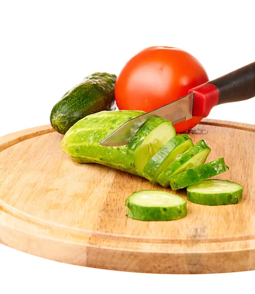 Sliced cucumber on a cutting board — Stock Photo, Image