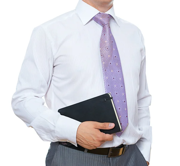 Homme d'affaires avec bloc-notes dans les mains sur blanc — Photo