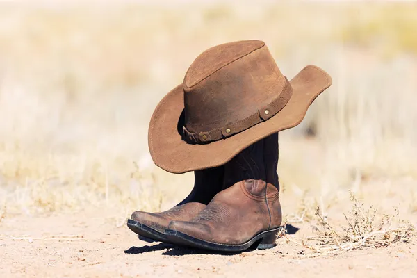 Sombrero y botas — Foto de Stock