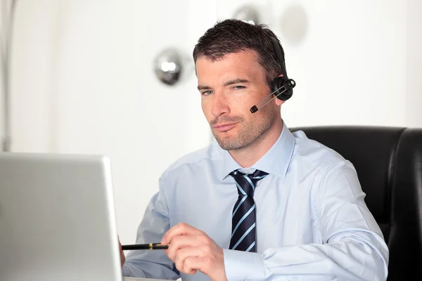 Handsome pensive businessman — Stock Photo, Image