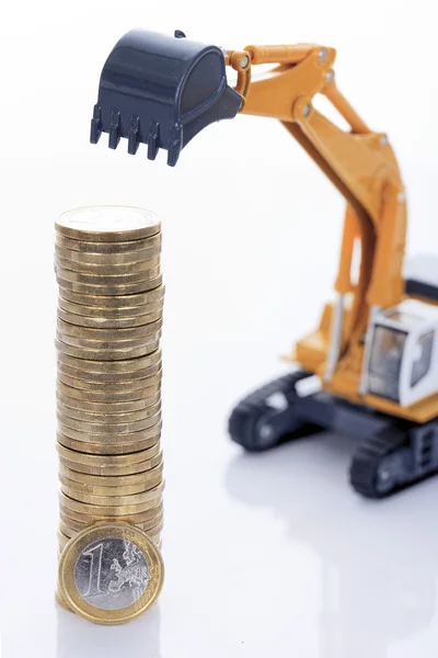 Euro money coins and digger Stock Photo