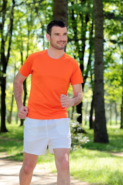 Running in a park — Stock Photo, Image