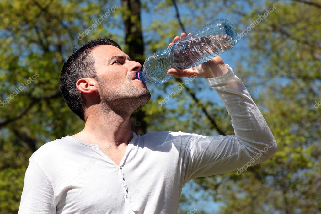 Drinking water in a park