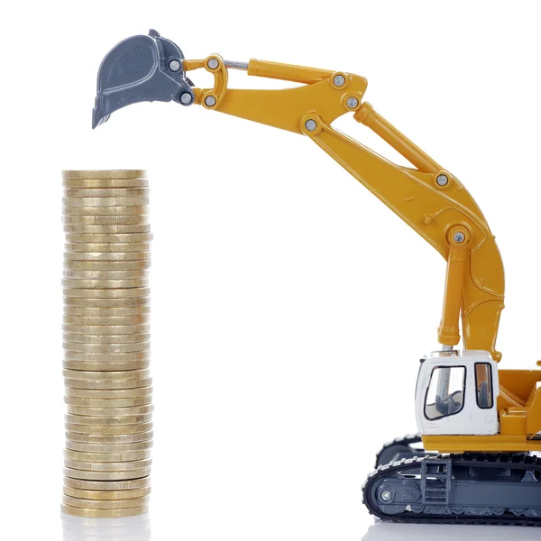 Münzen mit Bagger — Stockfoto