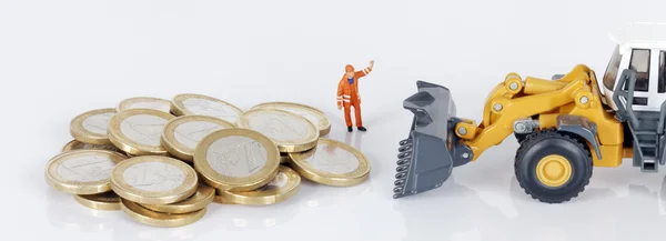 Coins with loader Stock Image