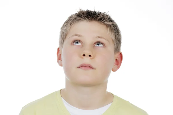 Portrait of boy looking up Stock Photo