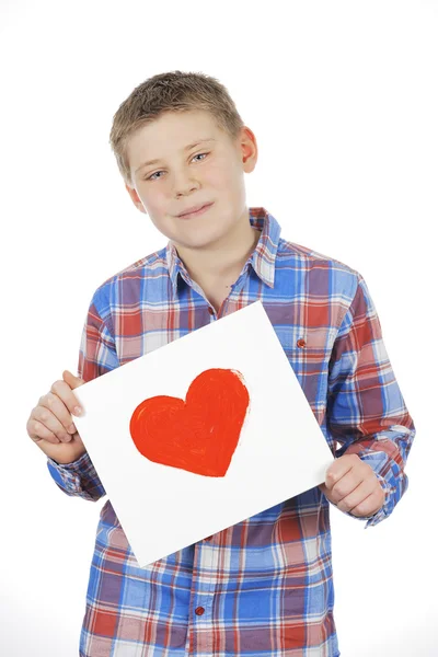 Herz in Jungenhänden — Stockfoto