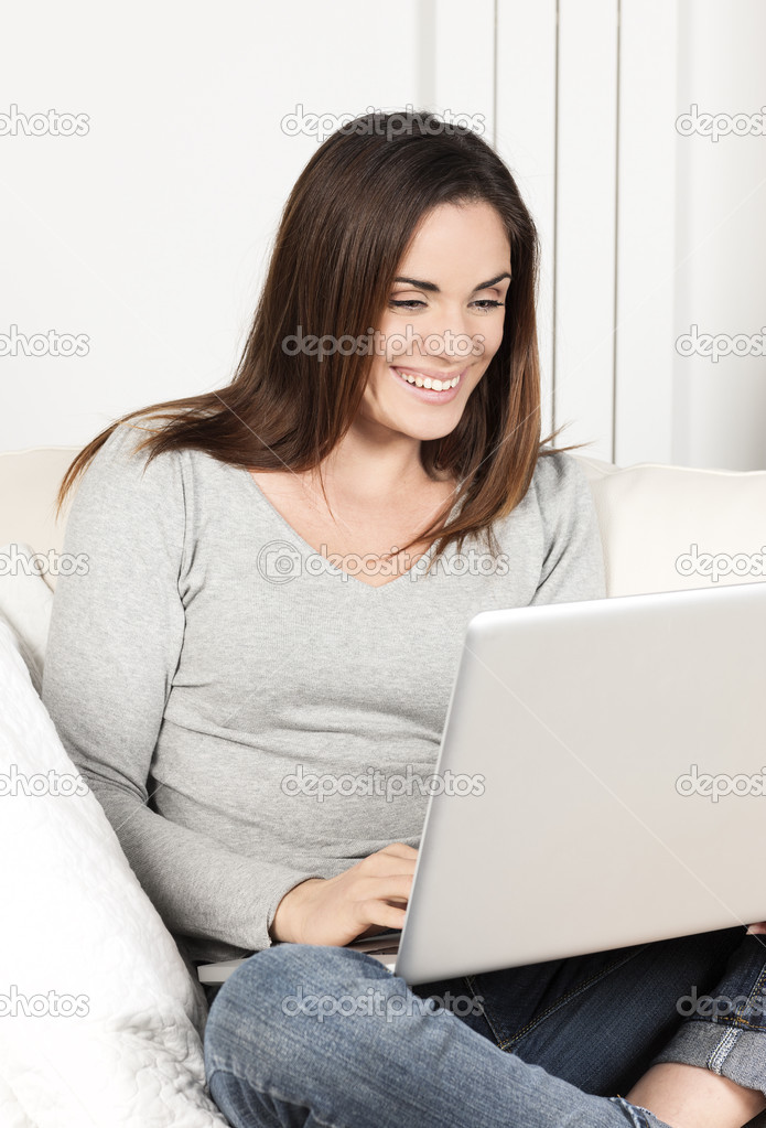 Portrait of woman using laptop