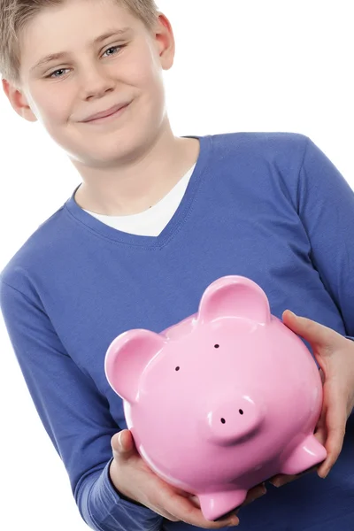 Menino com piggybank rosa — Fotografia de Stock