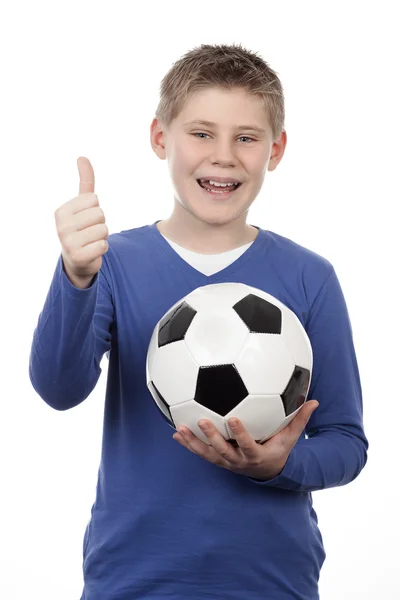 Giovane ragazzo in possesso di una palla da calcio — Foto Stock