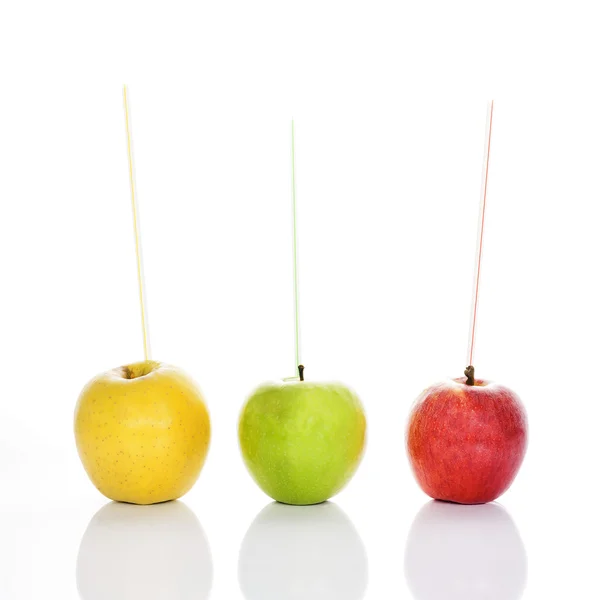 Manzanas con pajitas — Foto de Stock