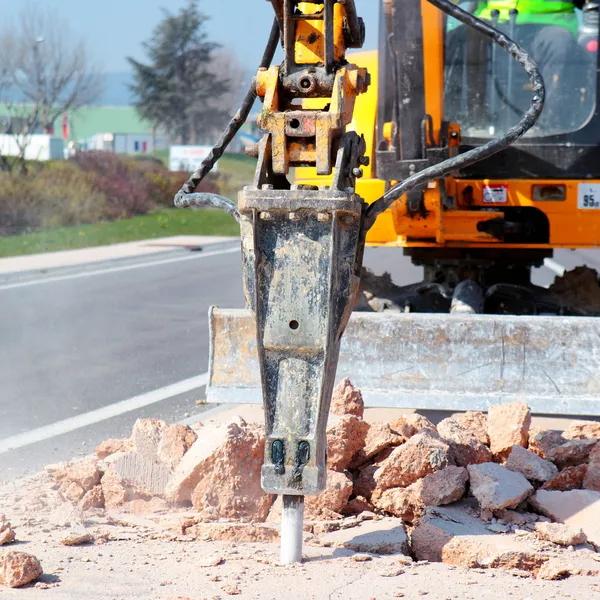 Jackhammer working on the road — Stock Photo, Image
