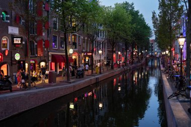AMSTERDAM, NETHERLANDS - AUGUST 23 2022:  the world famous red district in Amsterdam, Netherlands