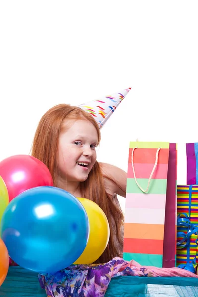 Happy party redhead girl with balloons and gift box — Stock Photo, Image