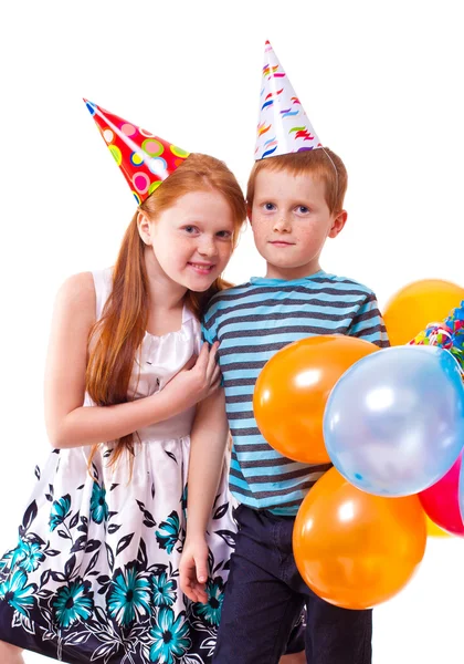 Redhead sister and brother celebrates birthday Stock Image