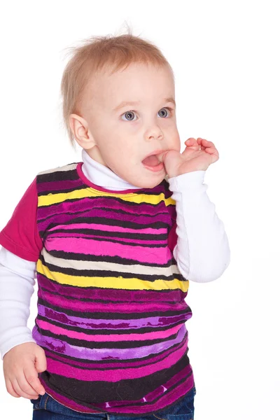 Funny little boy with finger in mouth — Stock Photo, Image