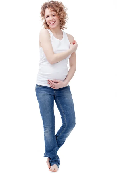 Positieve zwangere vrouw hamming geïsoleerd op witte achtergrond — Stockfoto