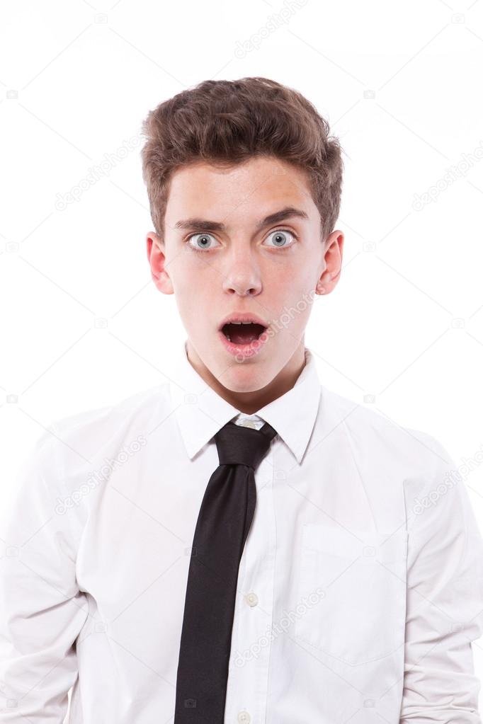 Surprised boy isolated on white background