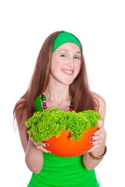 Mujer sonriente sosteniendo comida saludable para ensaladas, sobre blanco —  Fotos de Stock