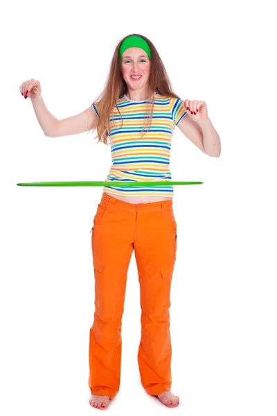 Junge Frau mit Hula-Hoop-Reifen über Weiß — Stockfoto