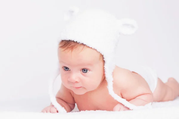 Portrait of cute little baby in a funny hat — Stock Photo, Image