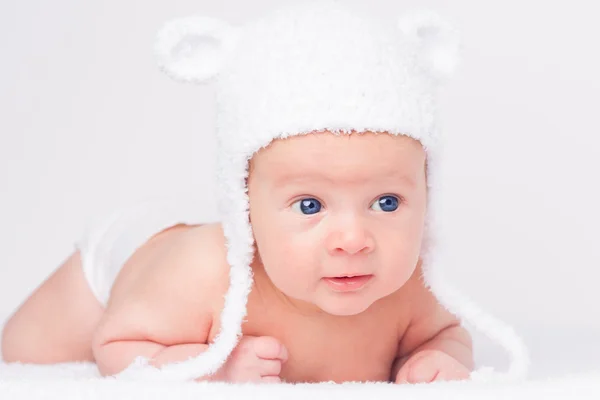 Portrait of cute little baby in a funny hat — Stock Photo, Image