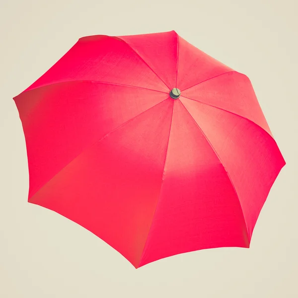 Wyglądowi retro czerwony parasol — Zdjęcie stockowe