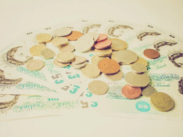 Retro olhar Libra nota e moeda — Fotografia de Stock