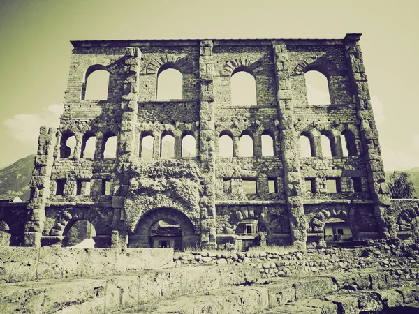 Vintage sepia romerska teatern aosta — Stockfoto