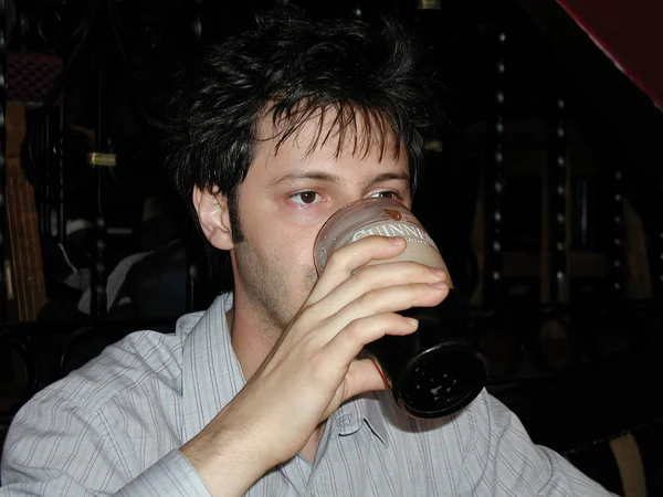 Man drinking Guinness — Stock Photo, Image