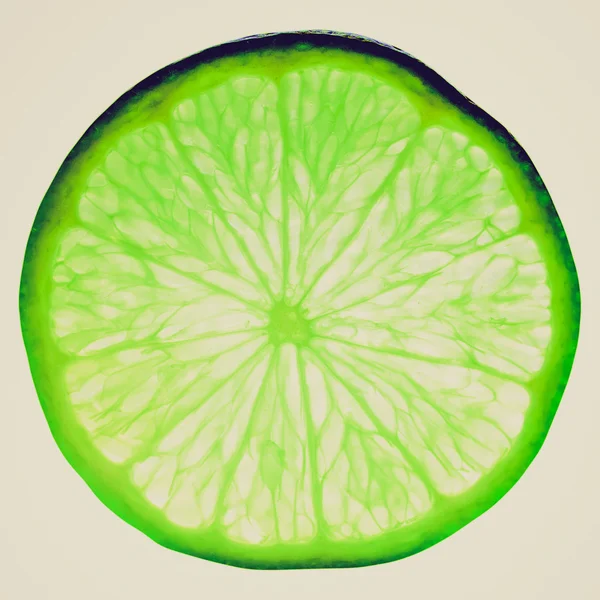 Retro look Lime slice — Stock Photo, Image