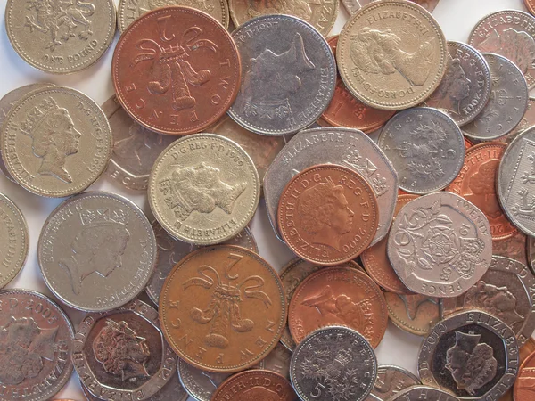 Фунтовые монеты — стоковое фото