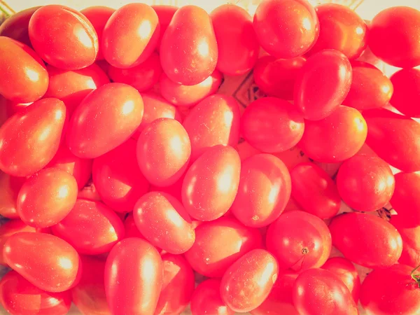 Regard rétro Tomate cerise fond — Photo